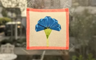 5 Schritte-Origami: Herrlich frisches Blumen-Fensterbild als Frühlingsdeko mit Kindern basteln